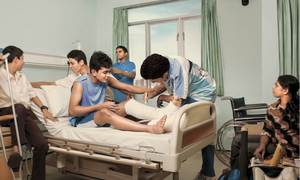 REAL LIFE NEVER STOPS: Boy in hospital